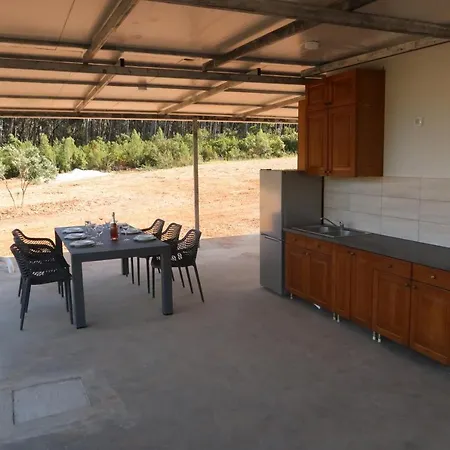 Robinson Olive Tree Huts *